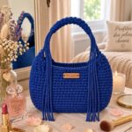 Sac bourse coulissant bleu marine au crochet, réalisé avec le fil Círculo Náutico 5 mm