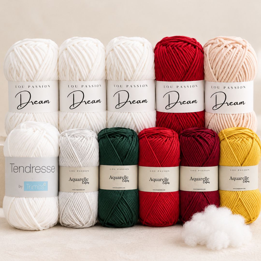 Kit CAL Mystère Novembre 2026 Lou Passion avec pelotes de laine dans un décor de Noël