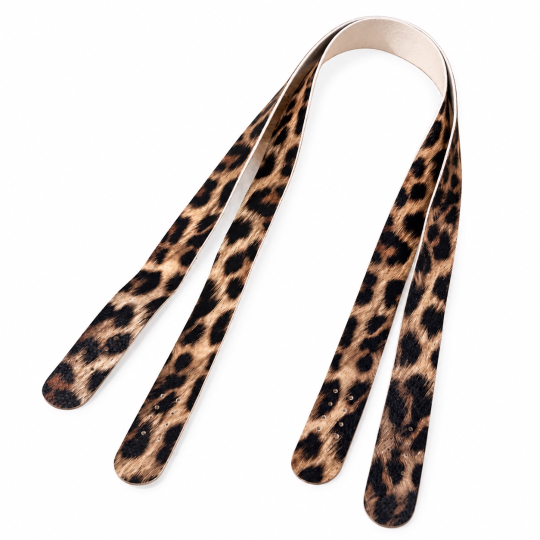 Lot de 2 anses de sac léopard en simili cuir souple de 75 cm, avec extrémités perforées, présentées sur fond blanc.